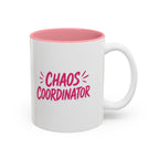 White coffee mug with pink interior featuring bold pink Chaos Coordinator text design