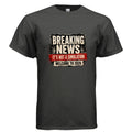 Distressed graphic t-shirt design reading “Breaking News It’s Not a Simulation Welcome to 2026” in bold cream, black, and red newspaper-style lettering.